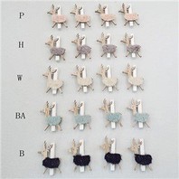 Are there any metal candle holders with a contemporary art design?